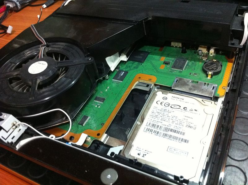 File:08- install everything back into the plastic bottom case.jpg