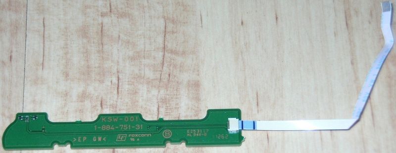 File:Power Eject board KSW-001 (PCB with ribbon cable, bottom view).jpg